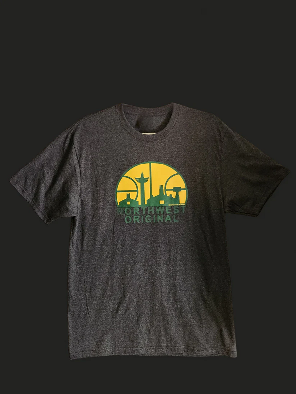 Charcoal grey tee with yellow and green logo similar to the old Seattle Supersonics logo, with Tommy Segundo's take on the Seattle skyline. "Northwest Original" in green type sits just below the logo.
