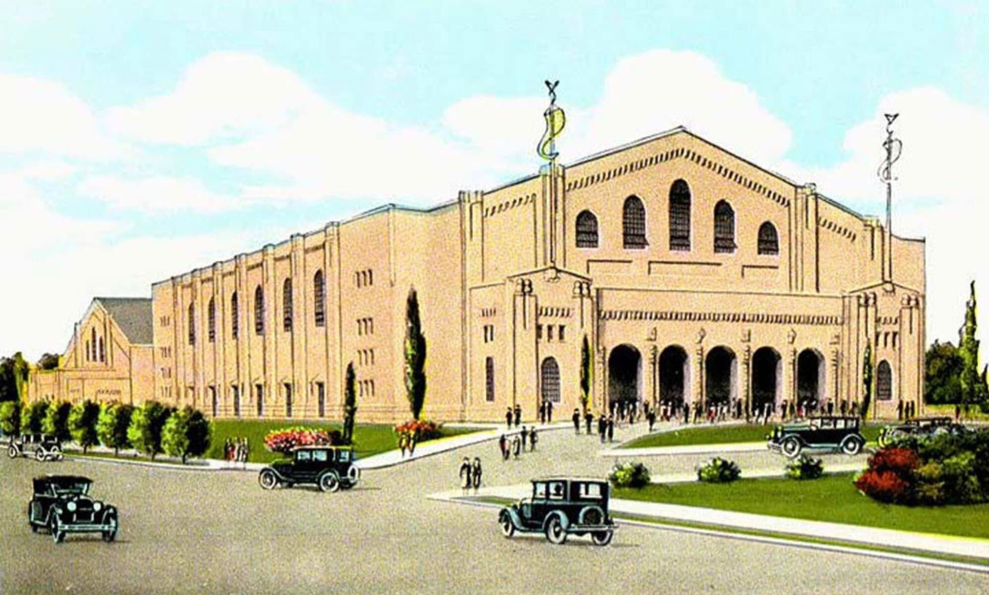 An illustration of the Seattle Civic Auditorium shows a grand tan building against an idyllic blue sky.