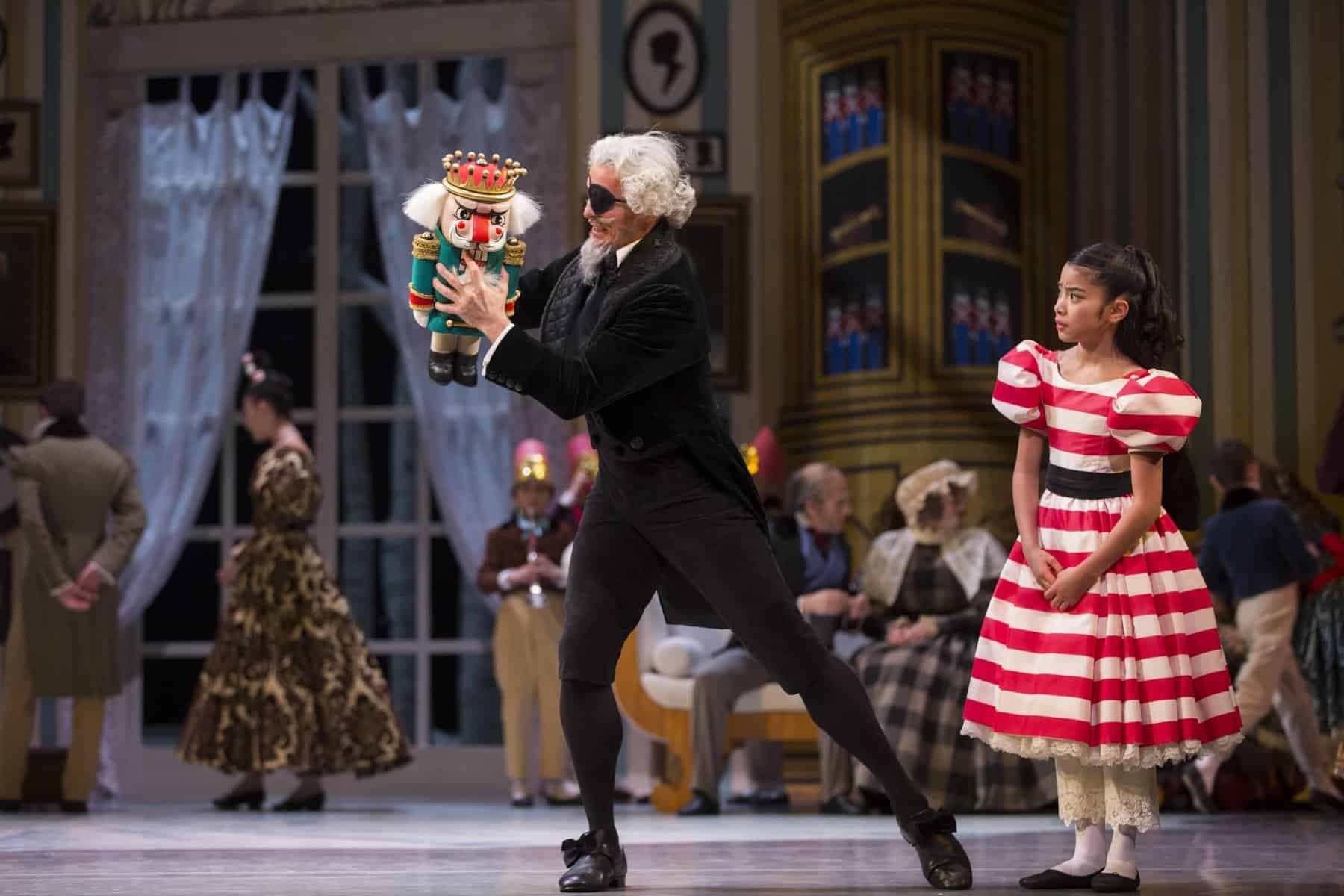 Clara, Drosselmeier, and Nutcracker doll. George Balanchine's The Nutcracker®, choreography by George Balanchine © The George Balanchine Trust. Photo © Angela Sterling.